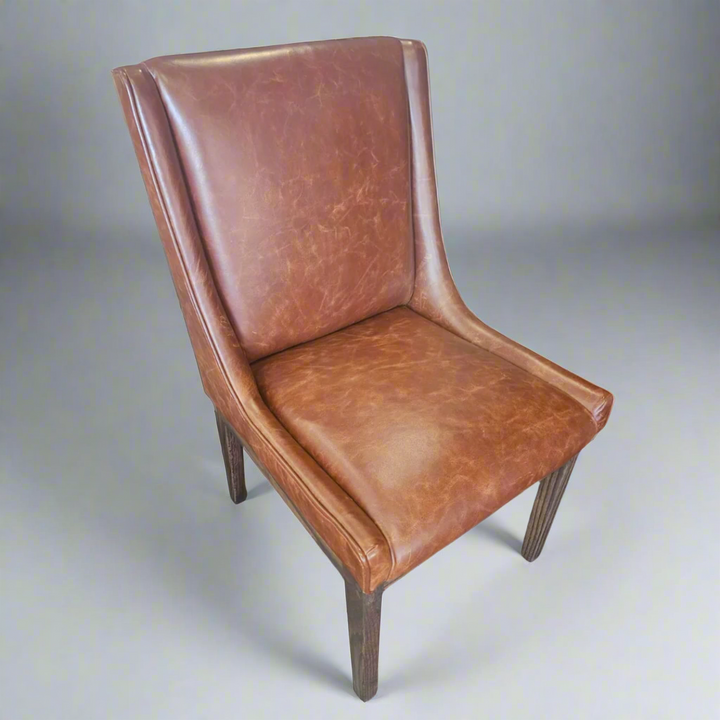 Nasira Chair Oak in Full Grain Leather colour Harness
More than just a chair, our stunning Oak Nasira chair Full Grain Leather colour Harness is a statement piece that brings elegance and sophistication to your dining space. Expertly crafted from high-quality Solid Oak, this chair seamlessly blends style and functionality, perfect for creating lasting memories with family and friends.