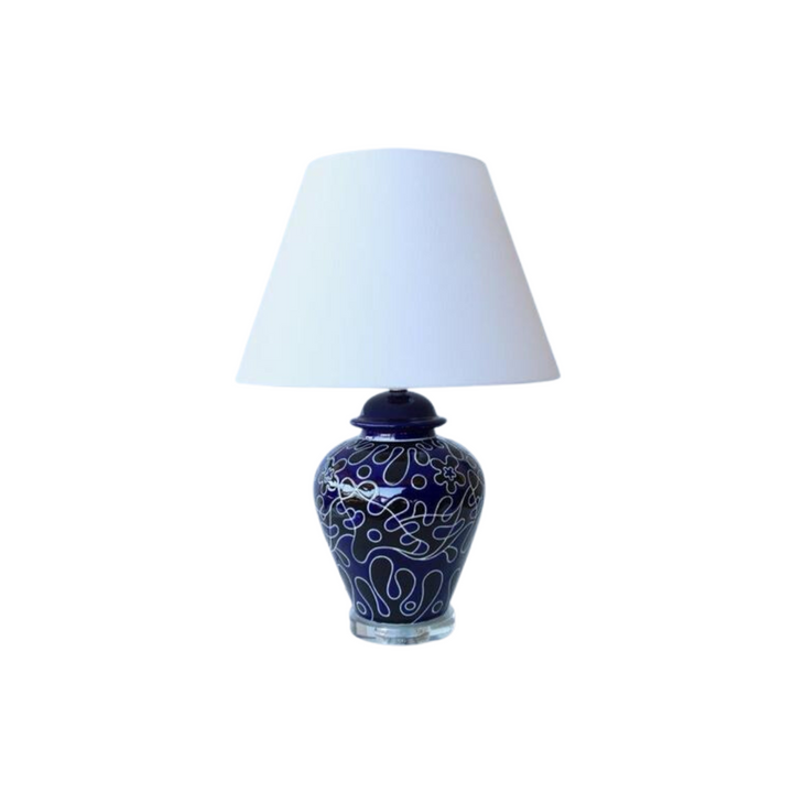 Luxury Navy & Black Lamp with Crystal Base
Elevate your home decor with this exquisite lamp from Unique Boys Interiors, showcasing a stunning crystal base and an elegant off-white shade. This masterpiece combines sophistication and modern style, perfect for adding a touch of luxury to any room. www.uniqueboys.co.za