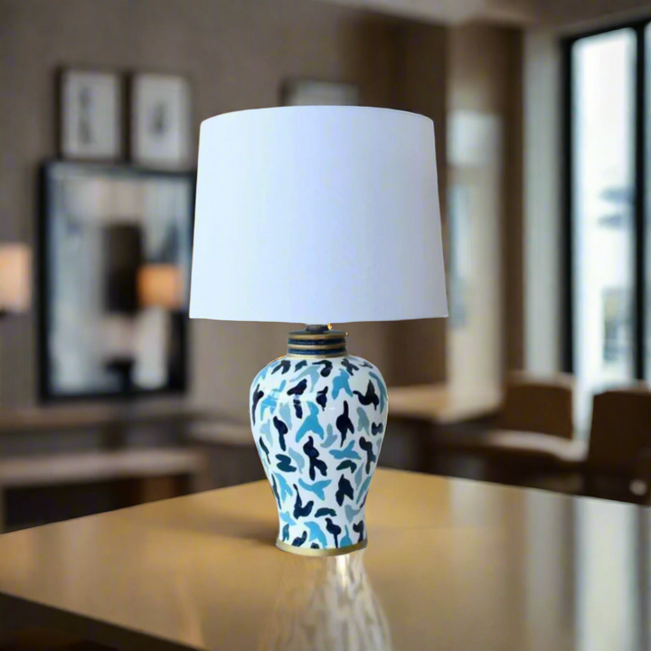 Unique Boys Interiors Navy &amp; Blue Design Lamp Base
Elevate your home decor with our stunning Navy &amp; Blue Design Lamp Base from Unique Boys Interiors. Expertly handcrafted to perfection, this lamp features a sophisticated navy and blue design that adds a touch of elegance to any room. Paired with an off-white shade, this lamp base creates a striking contrast that brings out the rich colors and intricate details.www.uniqueboys.co.za