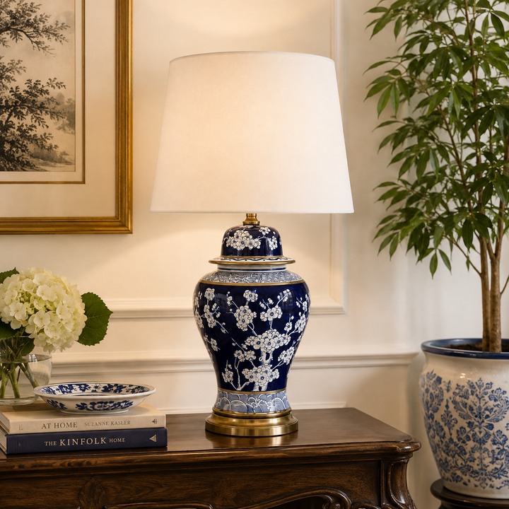 Luxury Navy Blue &amp; White Floral Ceramic Lamp with gold detailing and a crisp white shade for elegant home styling.