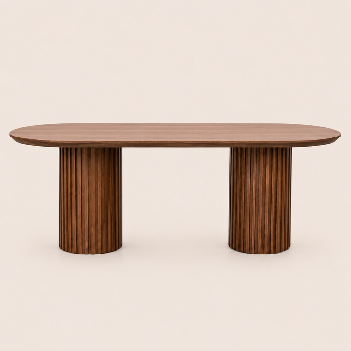 Oval Kiaat dining table finished in dark Rubio Monocoat