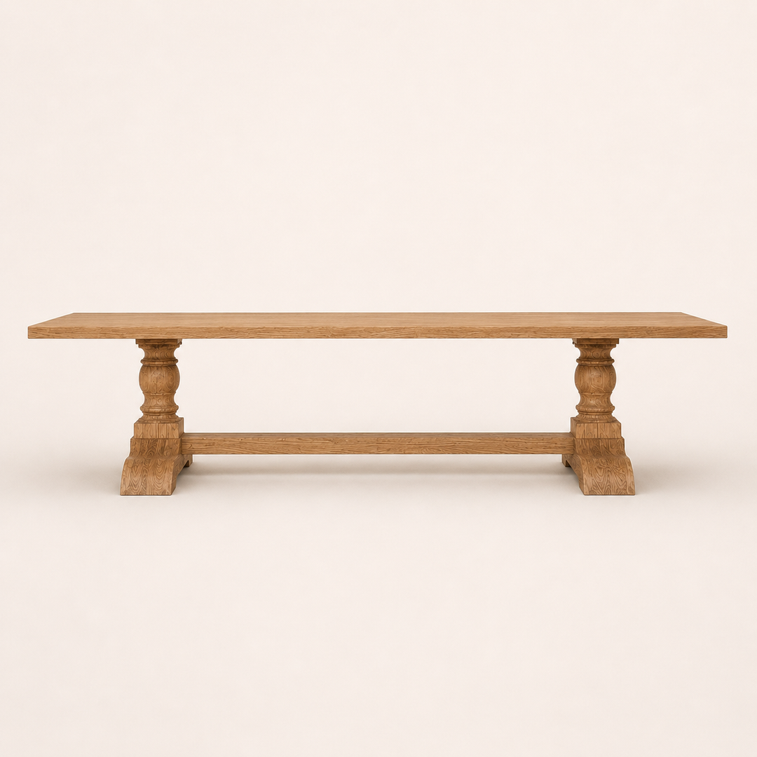 Oak Classic Centre-Turned Leg Dining Table

A timeless statement piece, handcrafted from natural solid oak. The sculptural centre-turned legs introduce a classic architectural element, while the beautifully finished oak top celebrates the natural grain and character of the timber.