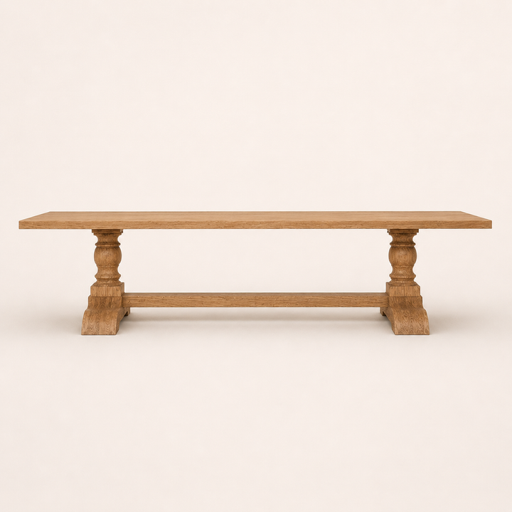 Oak Classic Centre-Turned Leg Dining Table

A timeless statement piece, handcrafted from natural solid oak. The sculptural centre-turned legs introduce a classic architectural element, while the beautifully finished oak top celebrates the natural grain and character of the timber.