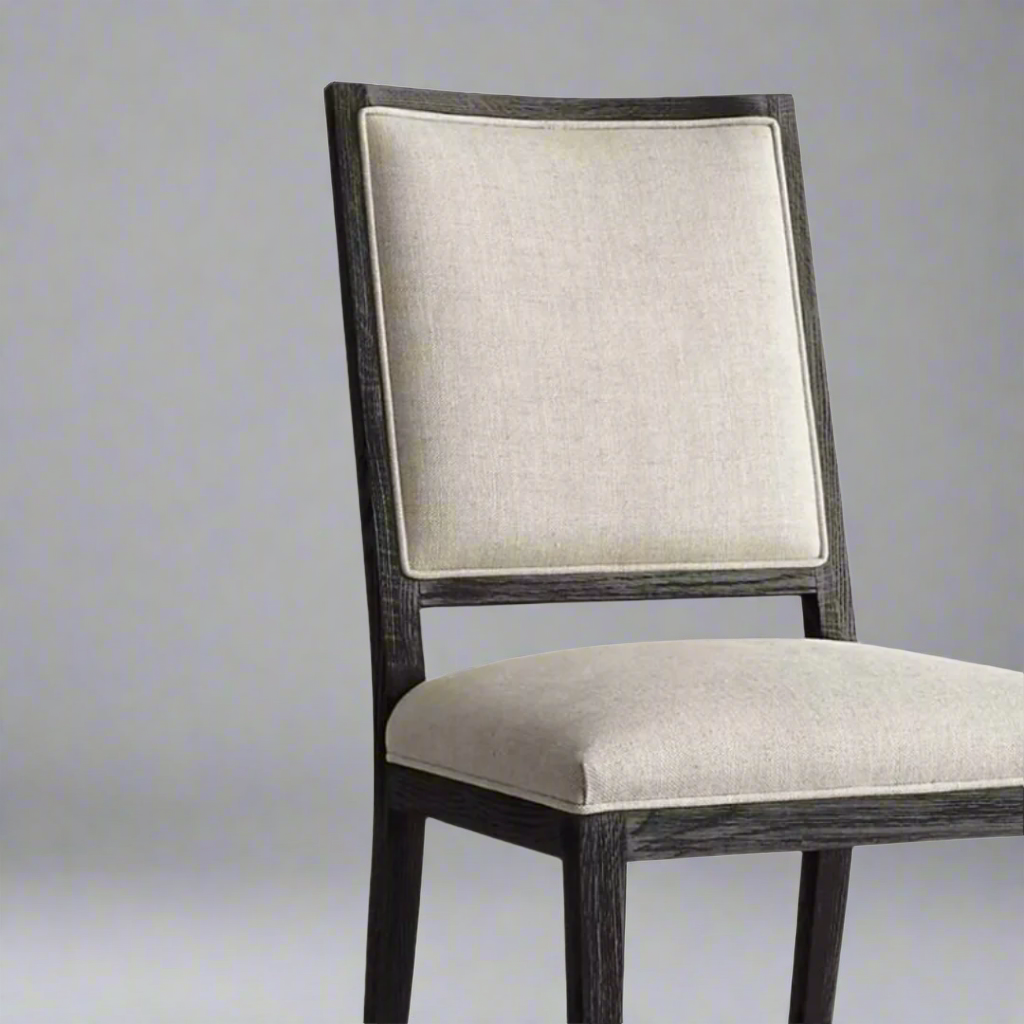 Oakley Chair in Oak with Mercis Fabric
Elegance Redefined
Elevate your dining space with our stunning Oakley Chair, expertly crafted from high-quality Solid Oak and upholstered with luxurious Mercis Alba fabric. This statement piece seamlessly blends style and functionality, perfect for creating lasting memories with family and friends.