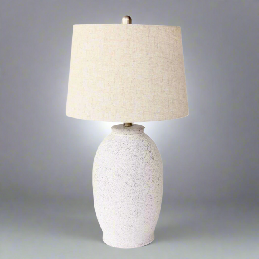 Off White Speckled Lamp Base Beige Linen Finial & lamp; Harp Shade 63X35cm. Warm up your space with the charming Off White Speckled Lamp Base. Its unique speckled design adds texture and visual interest, while the neutral beige linen finial and elegant harp shade bring a touch of sophistication to any room.Unique Boys.