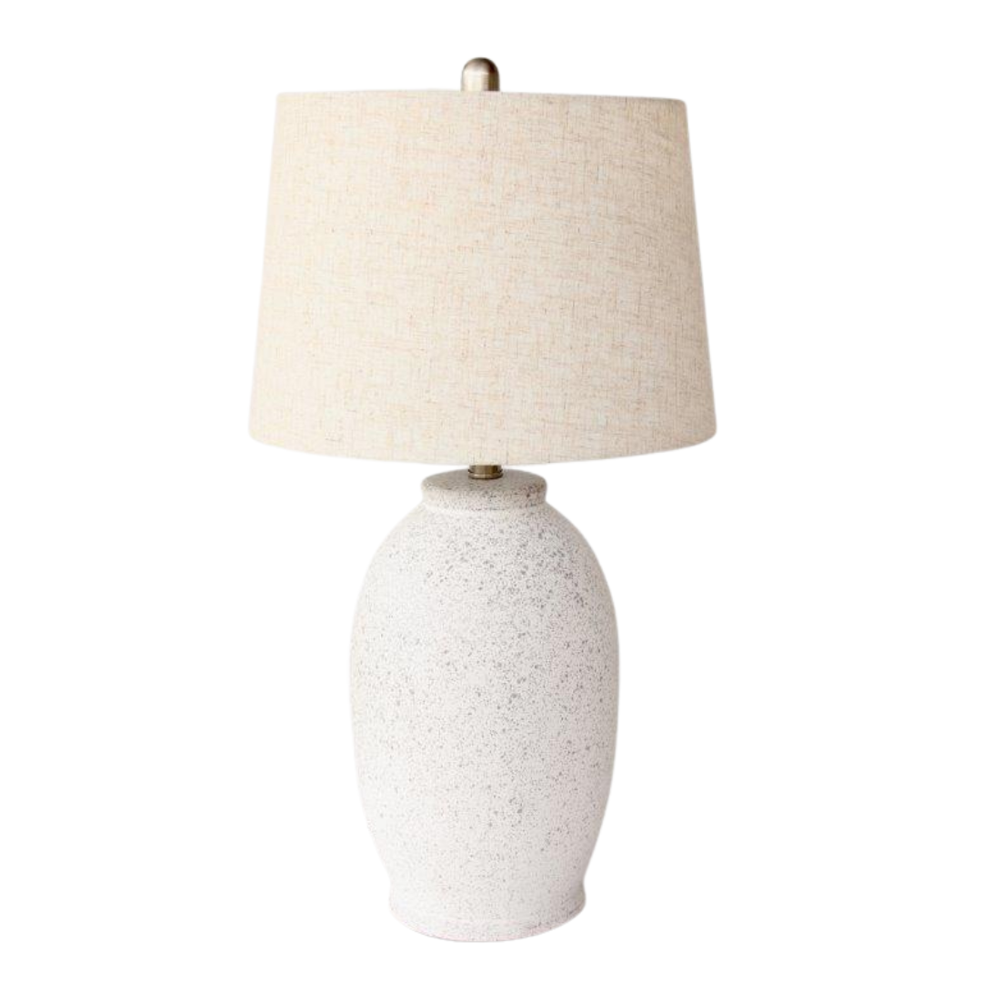 Off White Speckled Lamp Base Beige Linen Finial & lamp; Harp Shade 63X35cm. Warm up your space with the charming Off White Speckled Lamp Base. Its unique speckled design adds texture and visual interest, while the neutral beige linen finial and elegant harp shade bring a touch of sophistication to any room.Unique Boys.