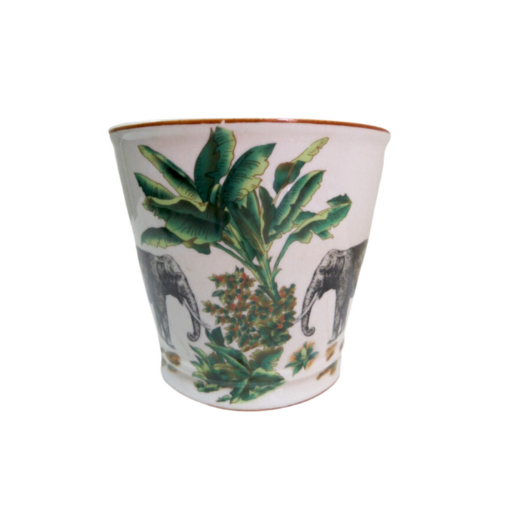 Origins Pot
Tropical Chic Decor Piece
Add a touch of exotic elegance to your home with this stunning Origins Pot. Crafted from high-quality porcelain, it features a vibrant pattern of elephants and palm trees that will transport you to a tropical paradise.