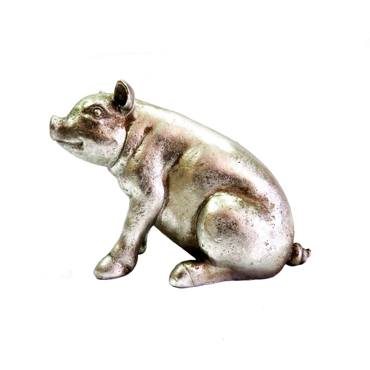 Zuzu The Pig is a stunning antique silver pig, measuring 23cm in length and 16.5cm in height. Made with precision, this 450g pig is visually appealing and exudes a sense of elegance. Its robust size is definitely a compliment to its design