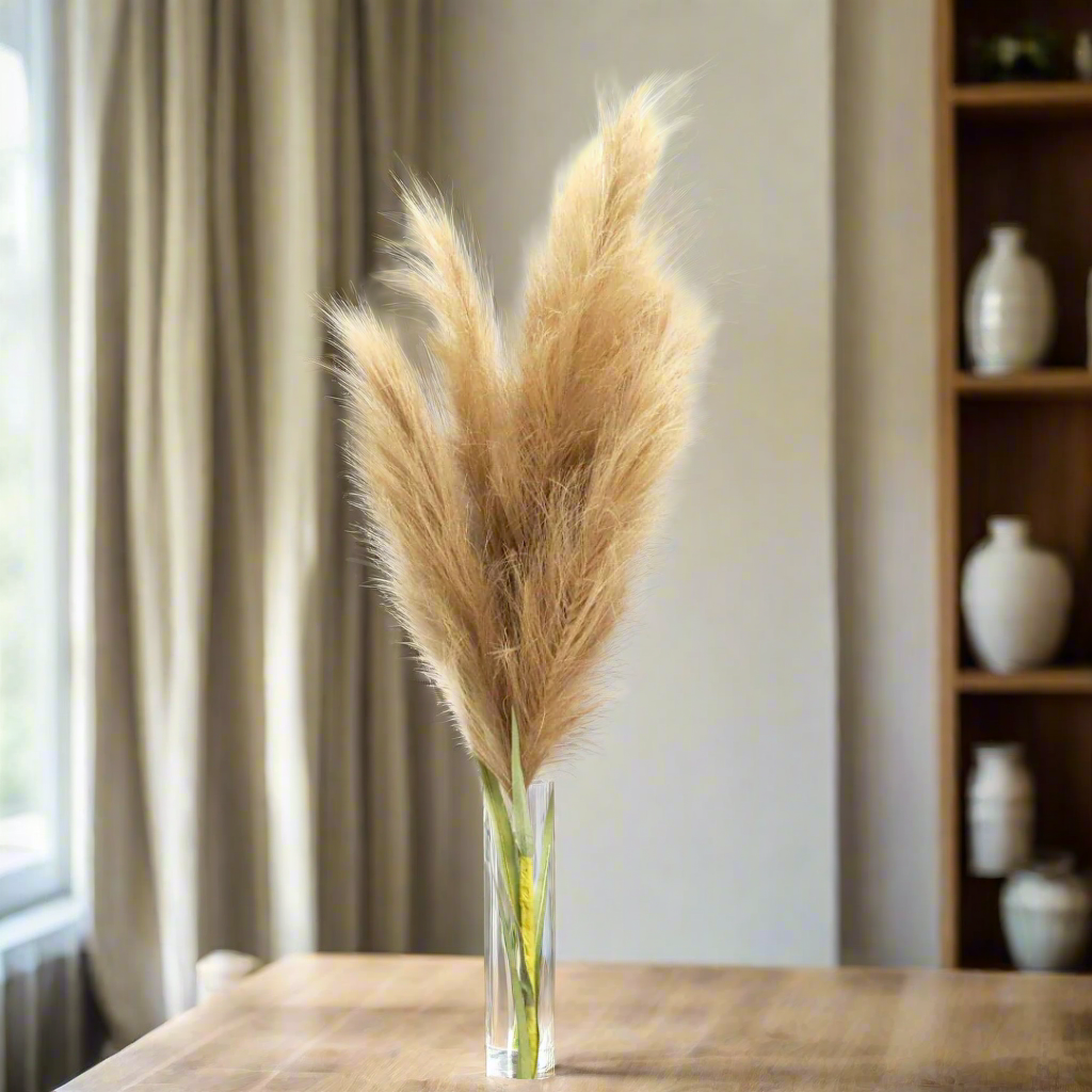 Product Details: Pampas Mega
Description: Experience the majestic beauty of Pampas Mega, a stunning addition to any space with its natural elegance and durability.
Material: High-quality fiber for a realistic look and feel.
Size: 126cm long
Category: Artificial Plants
Uses:
Home decor: Add a touch of natural elegance to your living room, bedroom, or dining room.
Event decor: Perfect for weddings, parties, and other special occasions.
Office decor: Bring some life to your workspace with this beautiful artifi