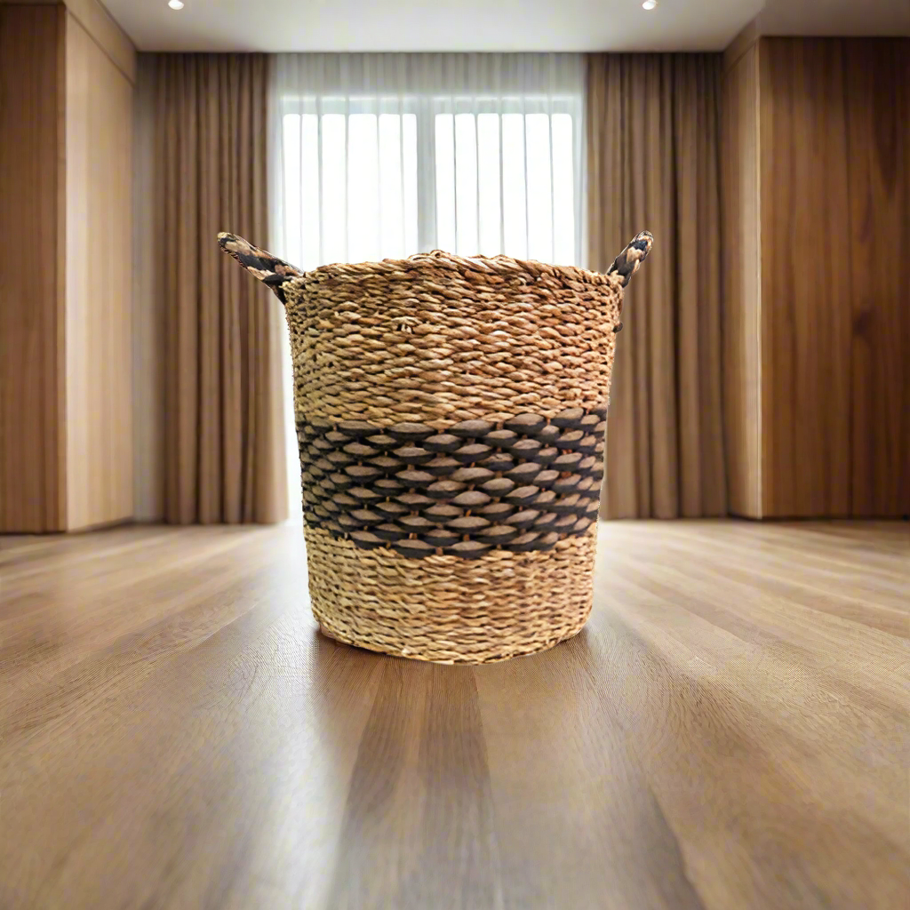 Product Details: Phelix Basket
Description: A stunning and chunky basket made from a combination of seagrass and jute, featuring a striking natural and black colorway.
Material: Seagrass and jute
Size: 40cm diameter x 40cm height
Features:
Handles for easy carrying
Chunky and beautifully woven design
Natural and black colorway
Uses:
Home decor: Add a touch of natural elegance to your living room, bedroom, or kitchen.
Storage: Perfect for storing books, magazines, or other small items.
Store: Unique Boys, of