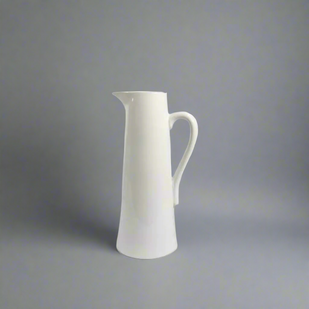 Port 2 Jug
The Port 2 Jug is a versatile and functional addition to your home decor. Measuring 16 X 12.5 X 30CM, this jug doubles as a planter, adding a touch of greenery to your space. Its sleek white design will effortlessly complement any style, making it a must-have for both practical and aesthetic purposes.