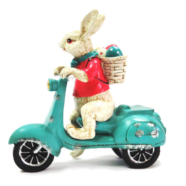 
Product Description: Vespa Rabbit
Meet the Vespa Rabbit, a unique and stunning handcrafted piece of art that combines whimsy and style. Expertly painted and detailed, this charming resin sculpture features a rabbit riding a Vespa, adding a touch of playfulness to any room.