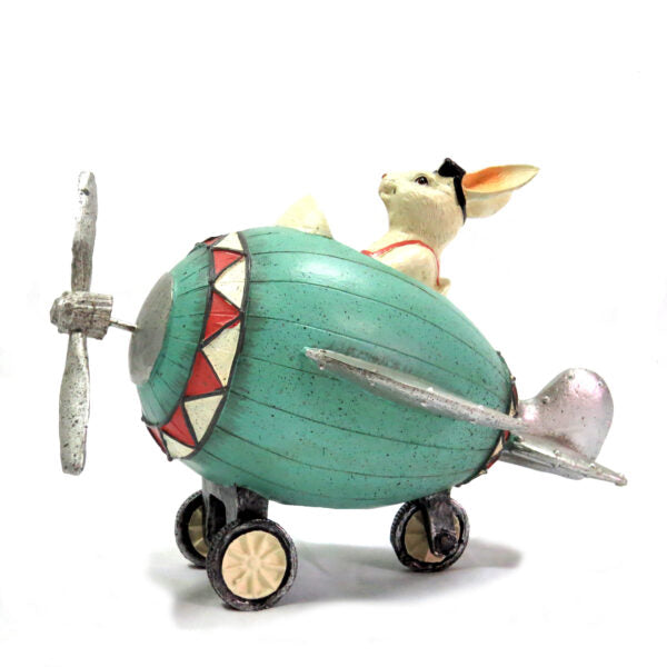 Maverick Rabbit
Product Description
Get ready for takeoff with the Maverick Rabbit! This charming, handcrafted figurine measures 24cm x 16.5cm x 17cm and features intricate details, including moving wheels and goggles. Its sturdy design makes it a delightful addition to any collection