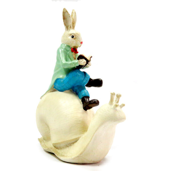 Speedo Rabbit Art Piece
Discover the enchanting world of Speedo Rabbit with this handmade and hand-painted art piece. Whimsical and exquisitely painted, this rabbit riding on his snail will transport you to Fantasy Land. Add a touch of magic to your home decor with this unique creation.