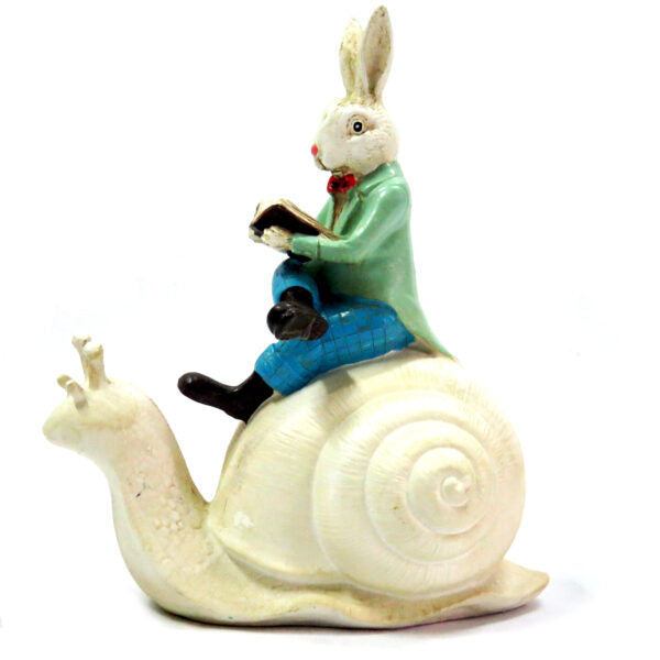 Speedo Rabbit Art Piece
Discover the enchanting world of Speedo Rabbit with this handmade and hand-painted art piece. Whimsical and exquisitely painted, this rabbit riding on his snail will transport you to Fantasy Land. Add a touch of magic to your home decor with this unique creation.