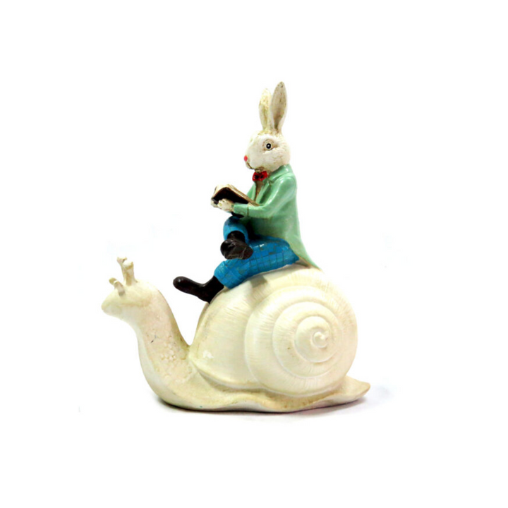 Speedo Rabbit Art Piece
Discover the enchanting world of Speedo Rabbit with this handmade and hand-painted art piece. Whimsical and exquisitely painted, this rabbit riding on his snail will transport you to Fantasy Land. Add a touch of magic to your home decor with this unique creation.