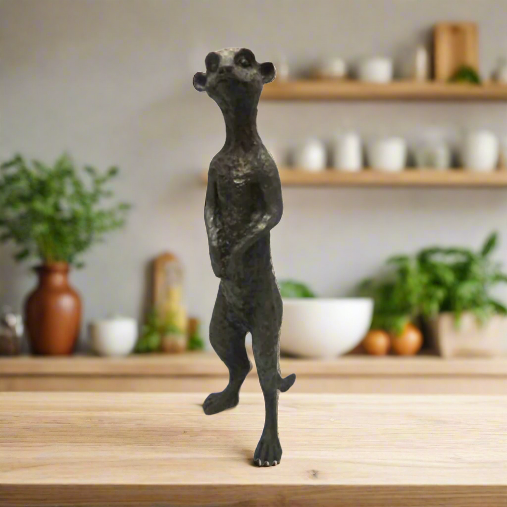 Riki Tiki Meerkat
Meet Riki Tiki Meerkat, the perfect addition to your home. Standing at 36.5cm tall and 11.5cm wide, this hand-cast meerkat is made from solid, recycled Earth Kind resin. With its beautiful bronze finish and unique meerkat-ish expression, this product not only adds African charm but also supports sustainable practices.