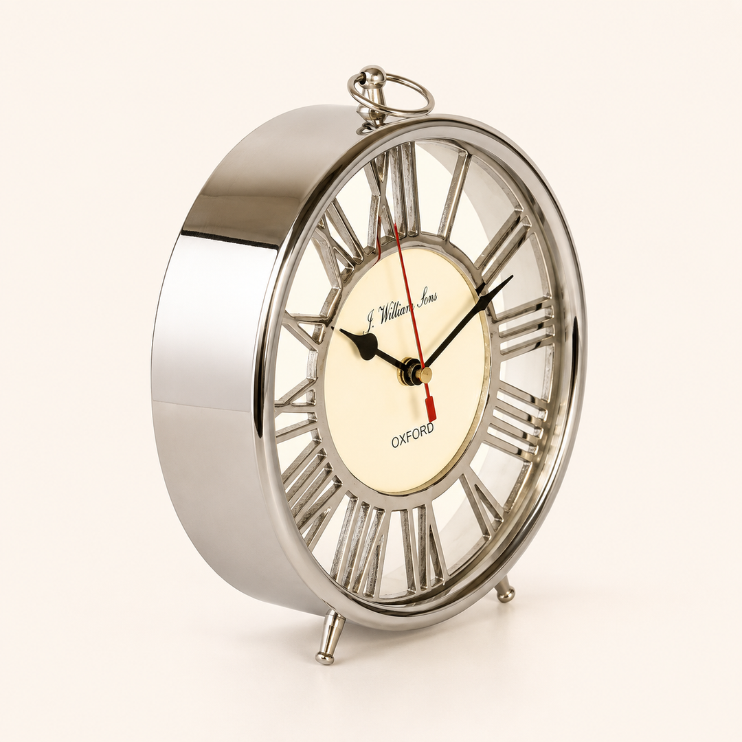 Add timeless style with this 22x20cm Round Silver Table Clock, perfect for consoles, desks and bedside tables.