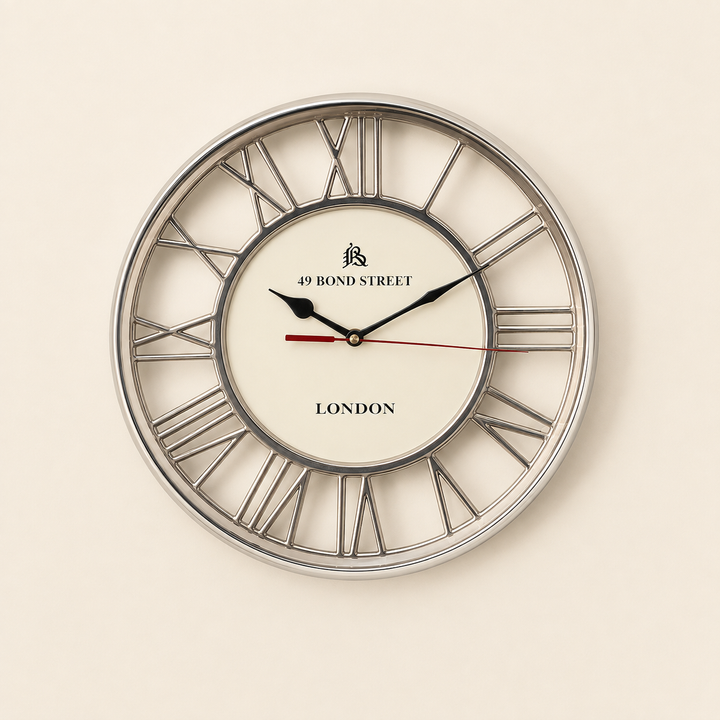 Round Silver Wall Clock 30cm with elegant Roman numeral detail, perfect for timeless interior styling.