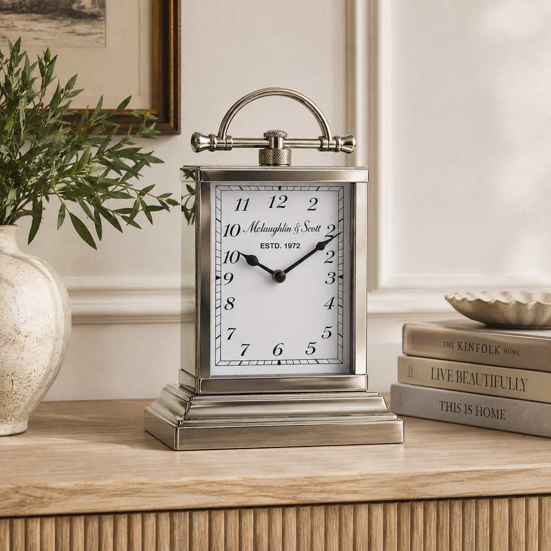 Add classic elegance with this Silver Standing Table Clock, ideal for consoles, desks and mantelpieces.