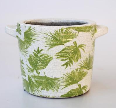 Charming Small Green Leaf Distressed Planter with Handle
Bring a touch of rustic charm to your home with this small green leaf distressed planter. Measuring 13x19.5x15cm, its distressed finish and adorable green leaf design make it perfect for displaying plants, flowers, or herbs. The handle allows for easy movement, making it a versatile decorative piece for any room.