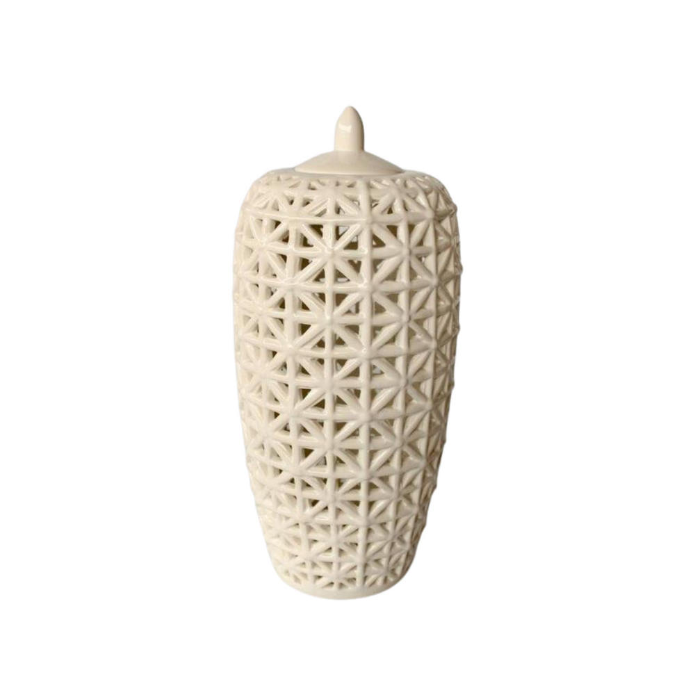Tall White Criss Cross Cut-Out Jar with Lid. Add a touch of sophistication to your space with the Tall White Criss Cross Cut-Out Jar with Lid. This beautifully crafted piece measures 45x20cm and features a stunning criss-cross design that adds depth and visual interest. The glossy white finish is both versatile and timeless, making it perfect for various decor styles.www.uniqueboys.co.za
