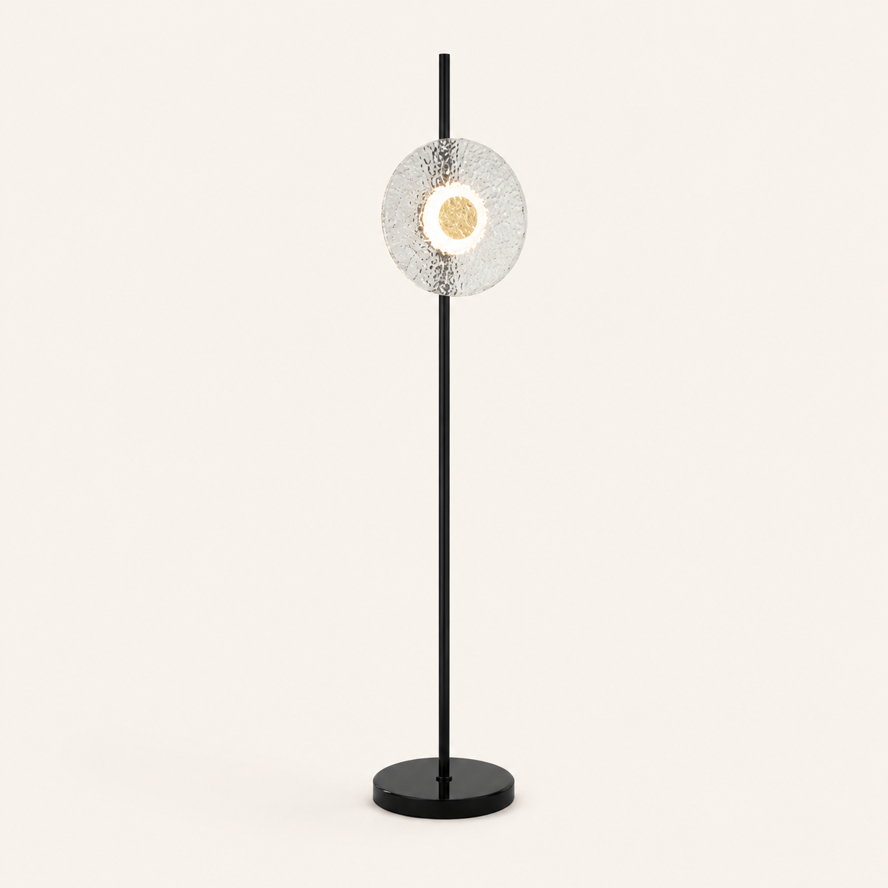 Create a stylish focal point with the Titus Floor Lamp, combining sculptural glass with modern black metal.