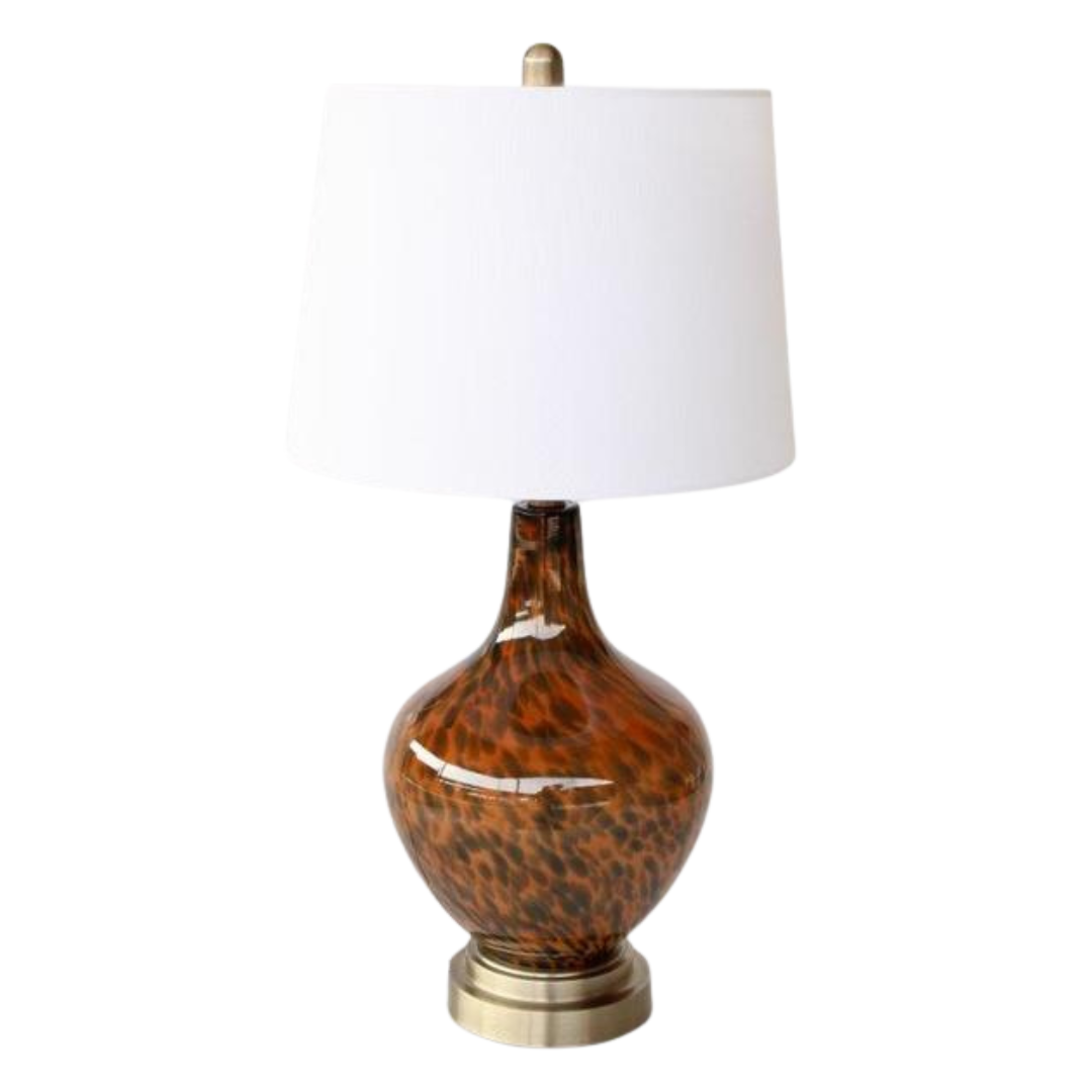Tortoise Shell Lamp Base White Finial &amp; Harp Shade 67X36cm
Elevate your home decor with our exquisite Elegant Tortoiseshell Lamp Base, a masterpiece of design and functionality. This stunning piece is expertly crafted to add a touch of sophistication and glamour to any room, making it a perfect addition to your living space.
The lamp base features a unique and rich tortoiseshell design, with intricate patterns that evoke a sense of luxury and refinement.