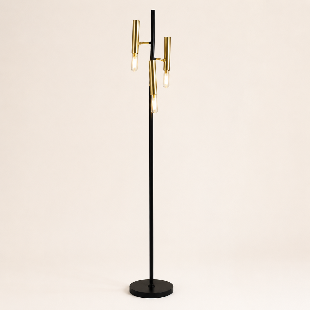 Add contemporary style with the Triple Floor Lamp, featuring adjustable gold lights on a slim black frame.
