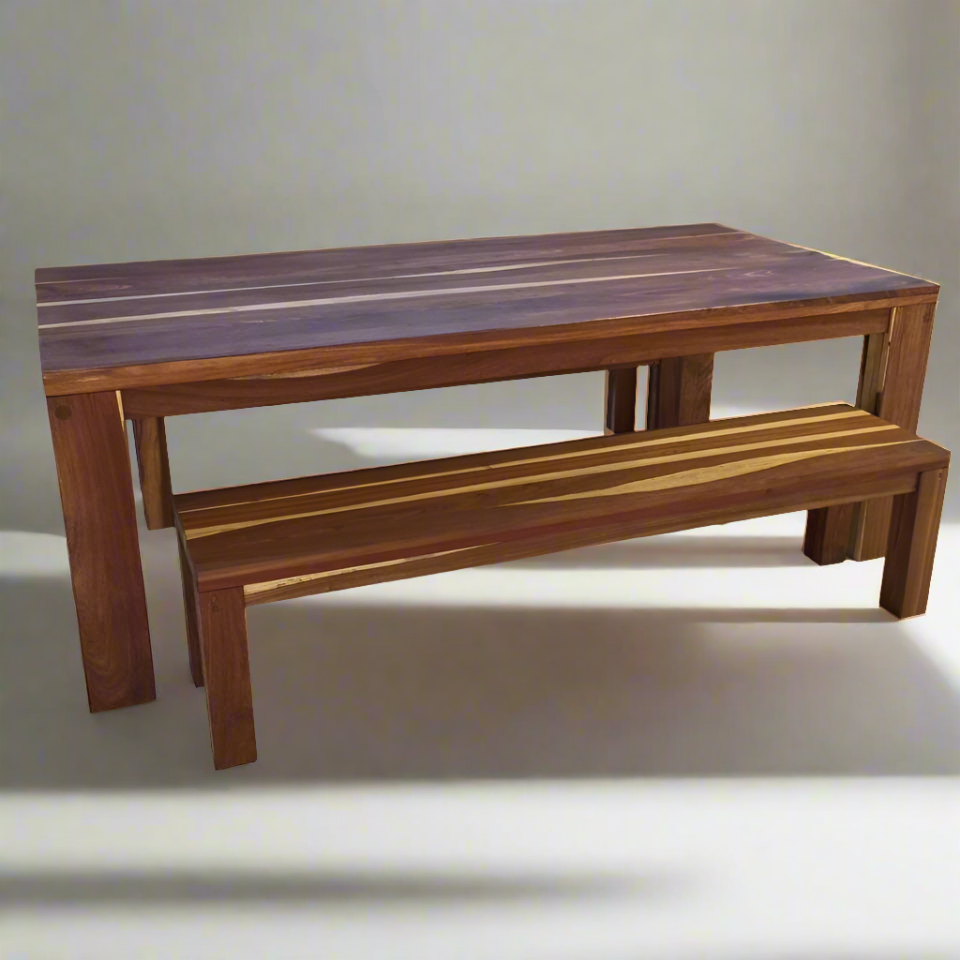 Unique Boys Kiaat Straight leg table table 2400x1000mmKiaat Straight leg table
Kiaat Straight Leg Table
Elevate your dining or workspace with our stunning Kiaat Straight Leg Table, crafted from the finest South African Kiaat wood. This durable and sustainable hardwood is renowned for its beautiful grain patterns and exceptional durability.