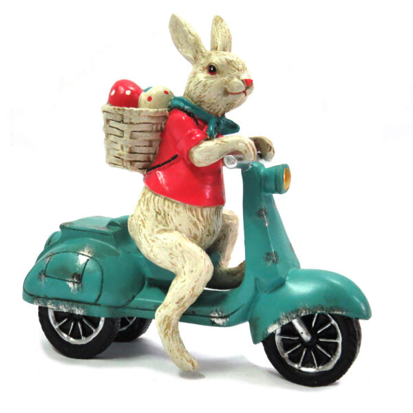Product Description: Vespa Rabbit
Meet the Vespa Rabbit, a unique and stunning handcrafted piece of art that combines whimsy and style. Expertly painted and detailed, this charming resin sculpture features a rabbit riding a Vespa, adding a touch of playfulness to any room.