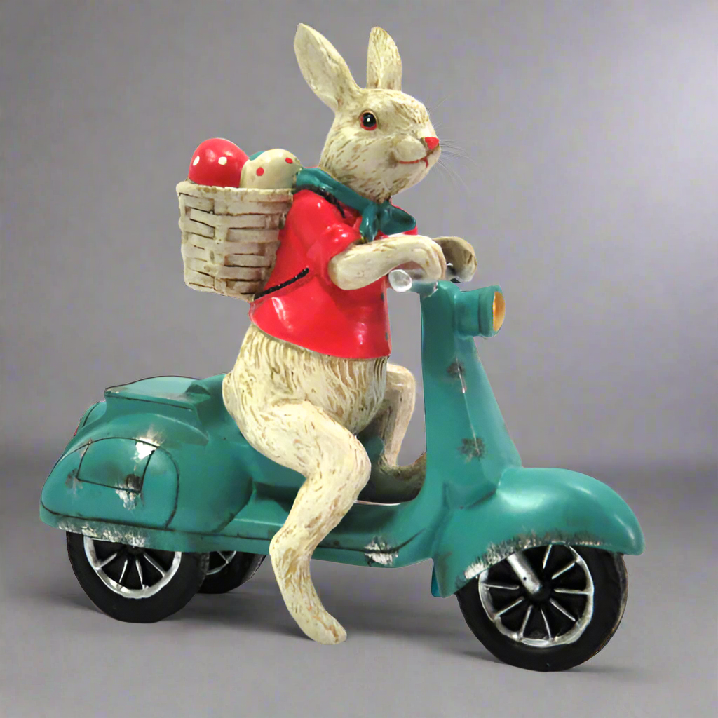 
Product Description: Vespa Rabbit
Meet the Vespa Rabbit, a unique and stunning handcrafted piece of art that combines whimsy and style. Expertly painted and detailed, this charming resin sculpture features a rabbit riding a Vespa, adding a touch of playfulness to any room.