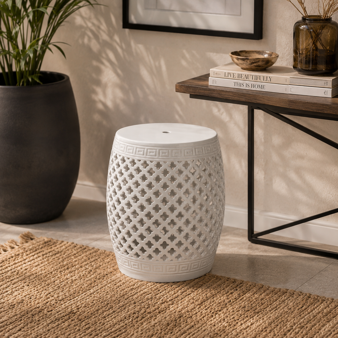 Shop the White Ceramic Garden Stool 46x31cm, featuring an elegant cut-out design for timeless décor.