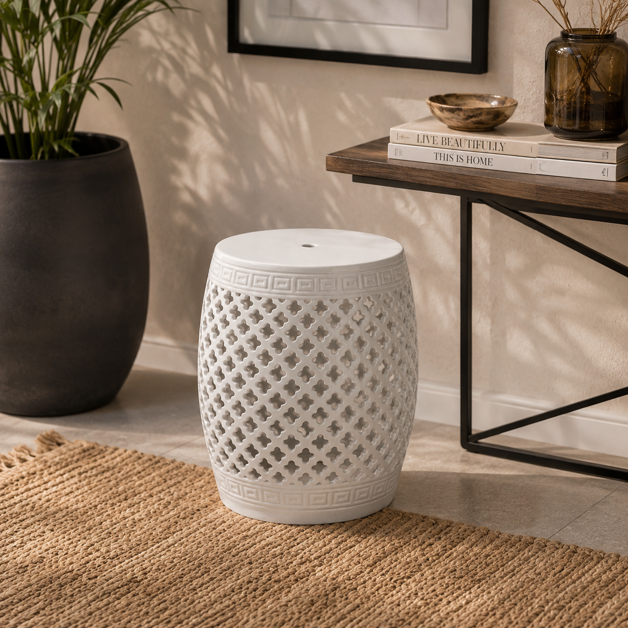 Shop the White Ceramic Garden Stool 46x31cm, featuring an elegant cut-out design for timeless décor.