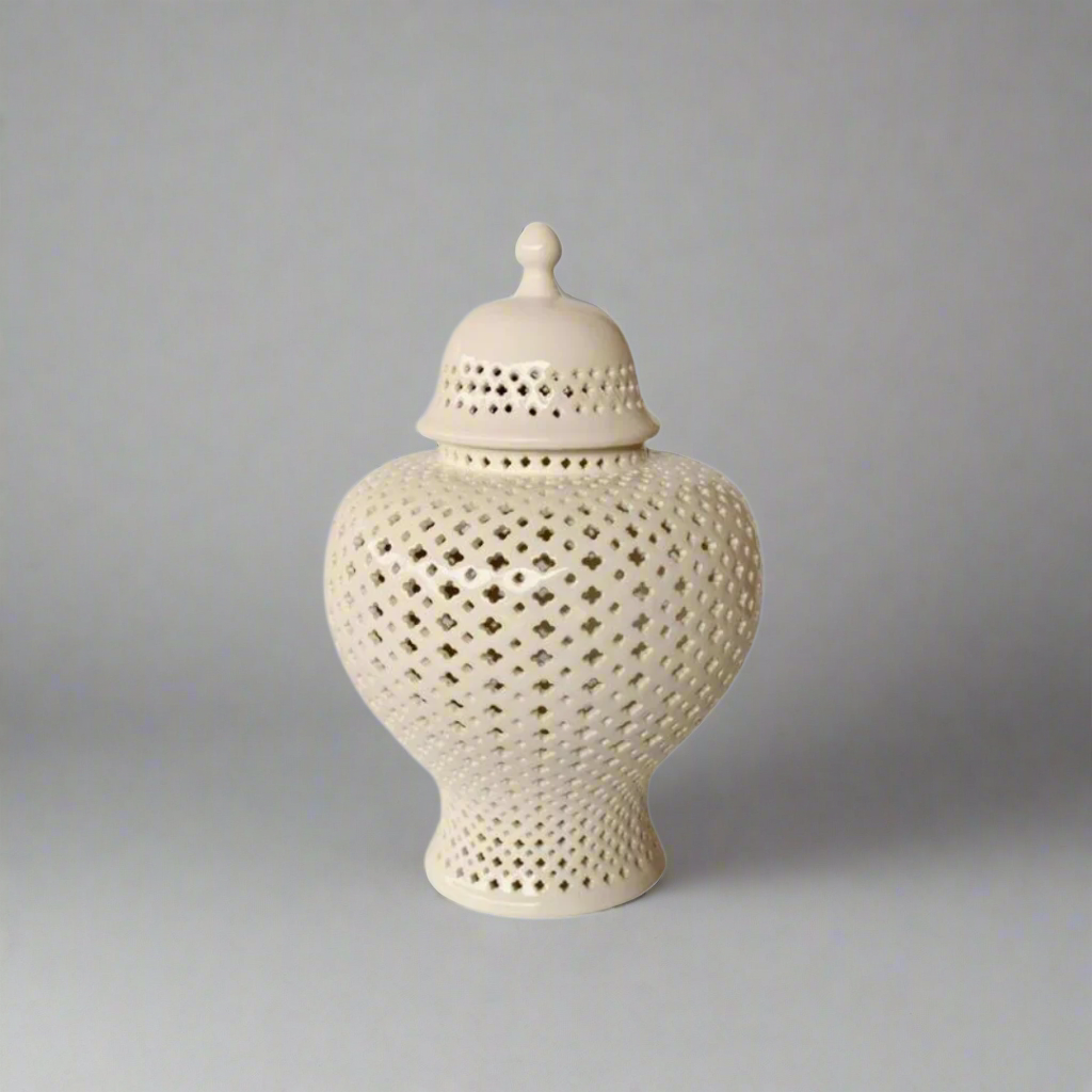 Make a Statement with Elegance: White Extra Large Fat Cut-Out Ginger Jar
Elevate your space with the majestic White Extra Large Fat Cut-Out Ginger Jar, a stunning piece that embodies elegance and sophistication. Measuring 49x30cm, this extra-large jar is expertly handcrafted with high-quality materials, ensuring durability and longevity. Its beautiful cut-out design and glossy white finish add a touch of refinement, making it a perfect fit for various decor styles. www.uniqueboys.co.za