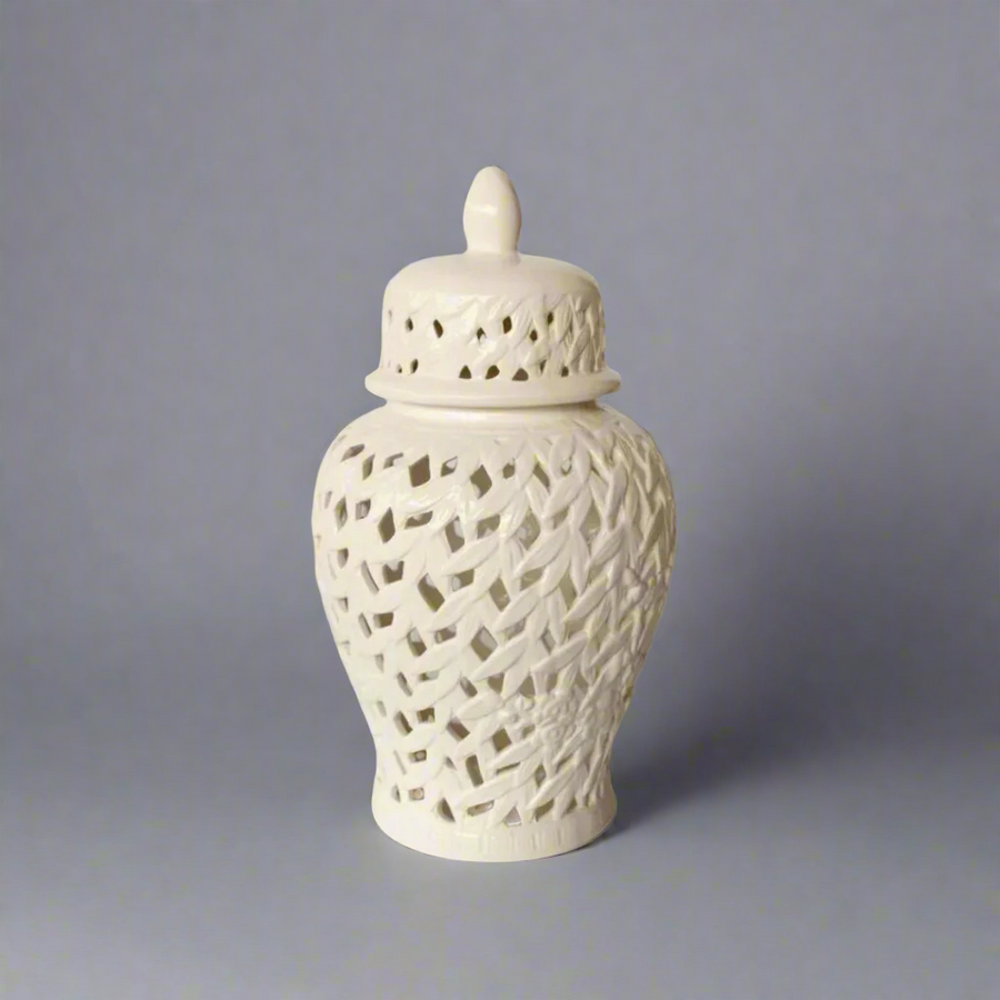 Elegant Decor Inspiration: White Flower &amp; Leaf Cut-Out Ginger Jar
Add a sophisticated touch to your home decor with our exquisite White Flower &amp; Leaf Cut-Out Ginger Jar. This stunning, handcrafted piece is carefully designed to bring elegance and charm to any room. Measuring 45cm x 25cm, its generous size makes it a perfect statement piece for decorative display on bookshelves, mantels, console tables, or any space that needs a touch of refinement.Unique Boys.