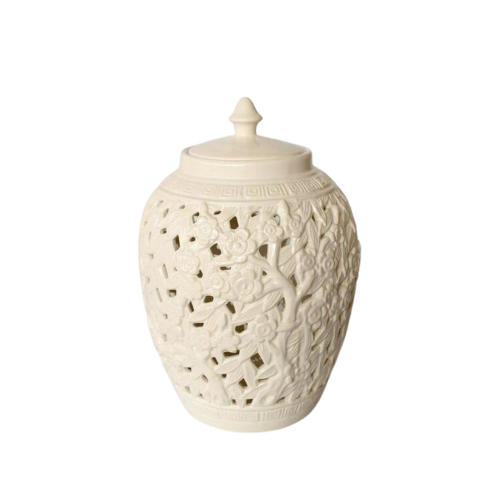 Elegant Conversation Starter: White Flower &amp; Leaf Cut-Out Jar with Lid
Elevate your home decor with the stunning White Flower &amp; Leaf Cut-Out Design Barrel Shade Jar with Lid, a masterpiece of elegance and sophistication. Measuring 40x27cm, this beautifully handcrafted jar features an intricate cut-out flower and leaf design that adds a unique touch to any room. The timeless white finish and matching lid make it a perfect fit for various decor styles. www.uniqueboys.co.za