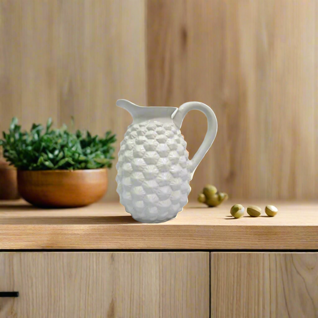 White Jade Pine Jug
Description
Elevate your home decor with the versatile and stylish White Jade Pine Jug. This elegant white jug can serve multiple purposes, from a planter to a decorative centerpiece.