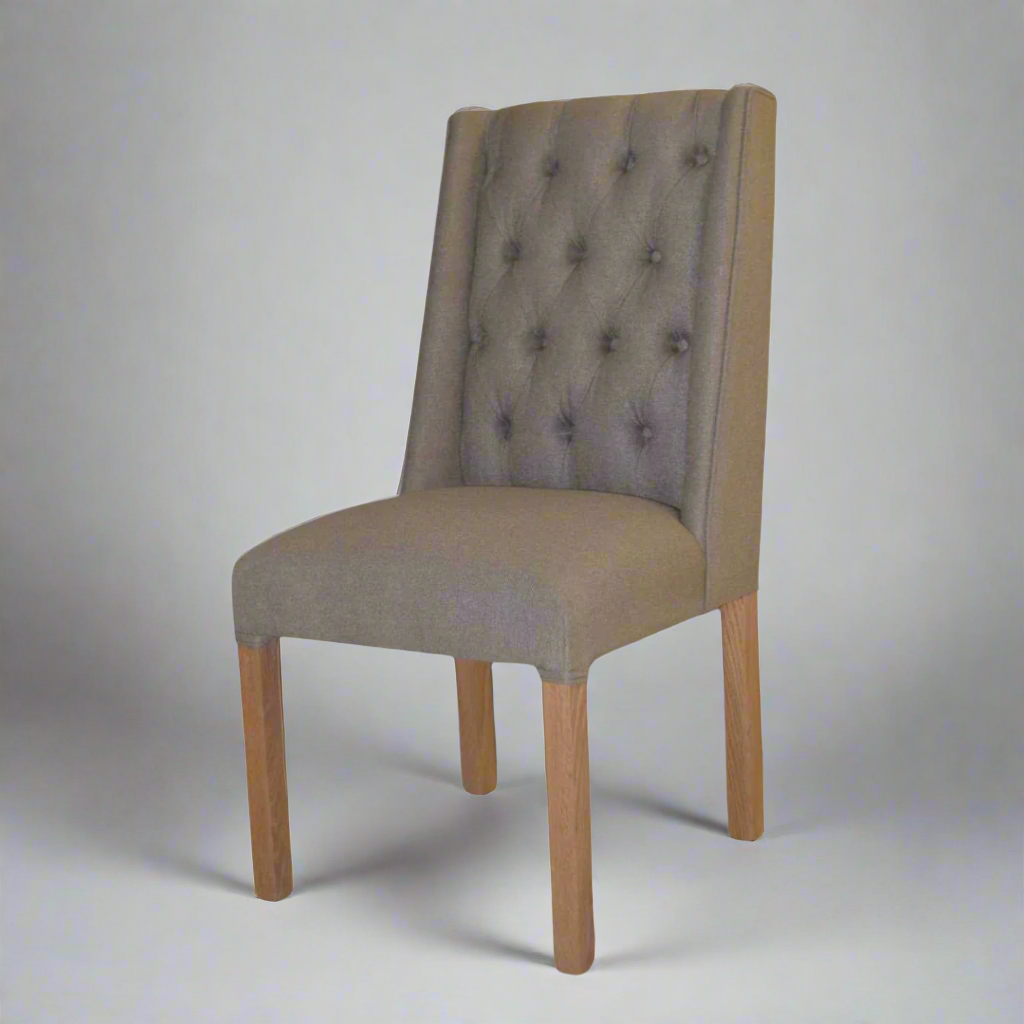 Windsor Deep Button Oak Upholstered Chair: Modern Elegance and Comfort
Experience the perfect blend of style and comfort with the Windsor Deep Button Oak Upholstered Chair. This sleek and modern design features a sturdy oak frame, deep button upholstery, and luxurious brown fabric from Hertex Fabrics.