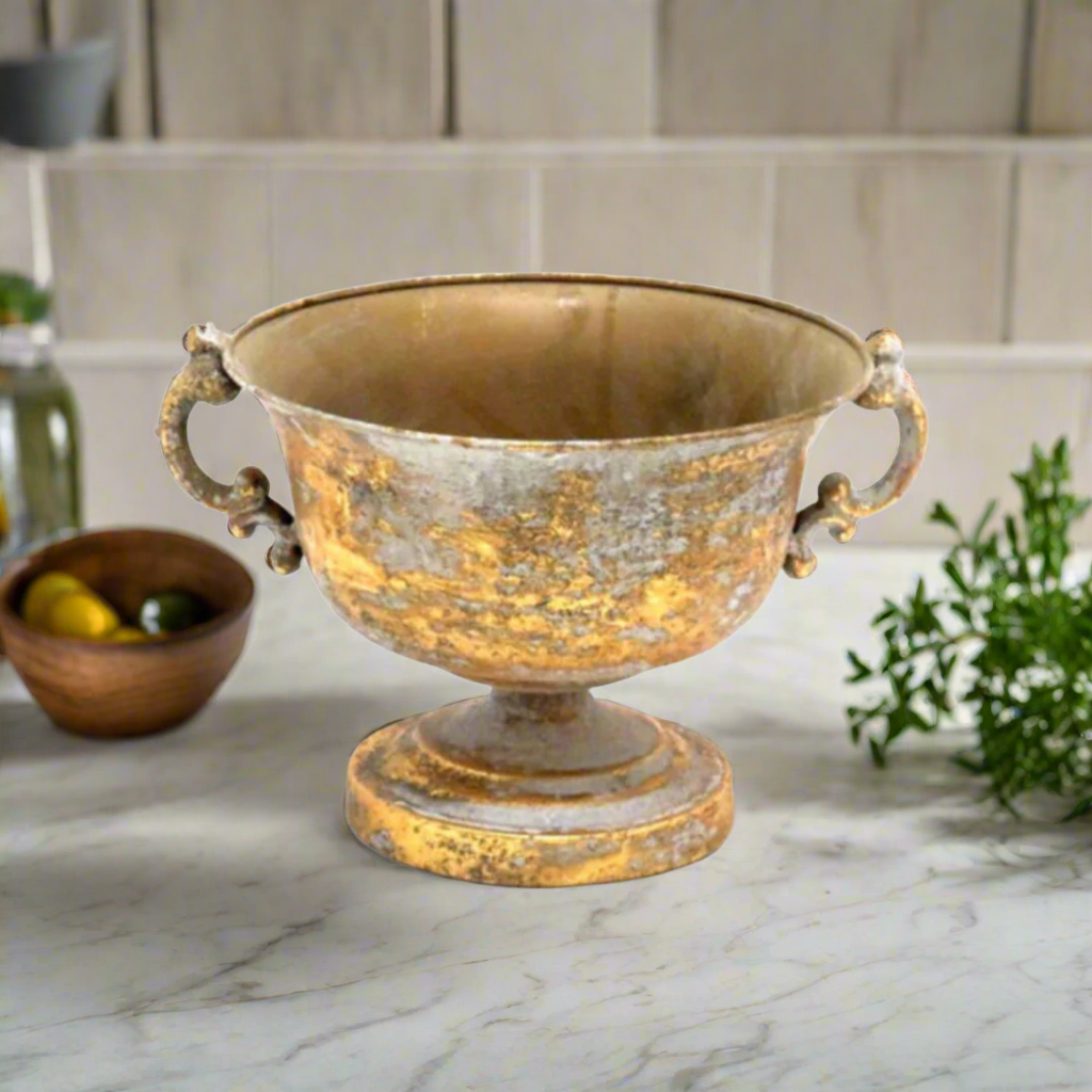 Xanthe Trophy Vase
Elevate your event or competition with our exquisite Xanthe Trophy Vase. This stunning piece is crafted from high-quality metal and features a sophisticated antique gold finish.