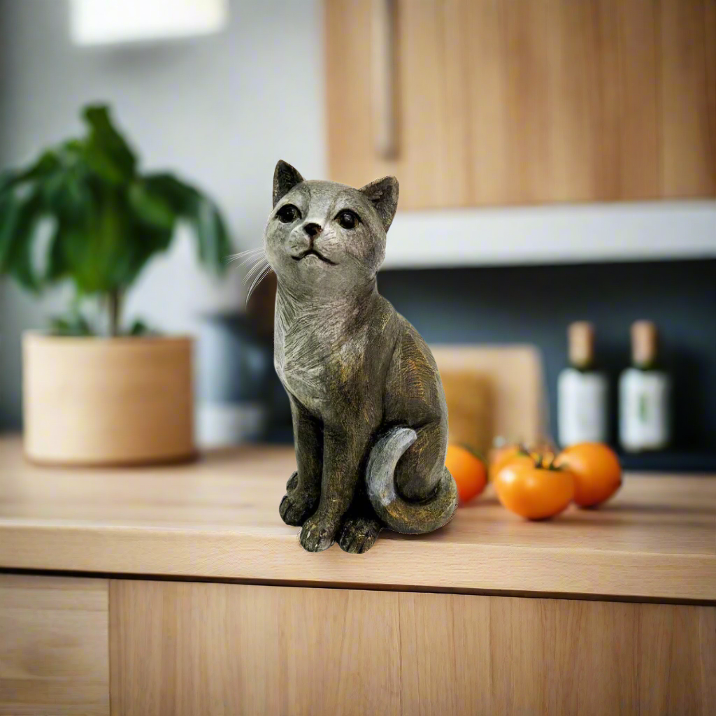 Product Description: Zilla Cat
Elevate your home decor with the stunning Zilla Cat, a one-of-a-kind grey-toned decorative piece. Standing 29cm high, this charming cat decor is sure to make a statement and add a touch of unique style to any room.