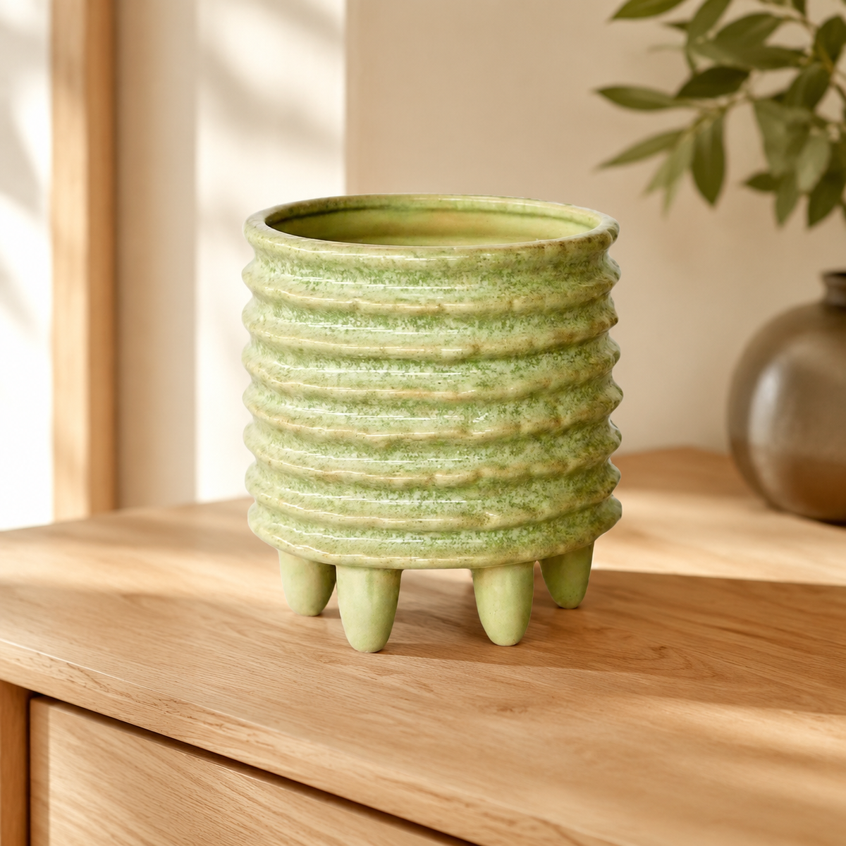 Aqua Green Ceramic Planter On Feet lifestyle view