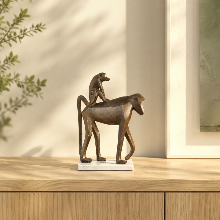 Baboon with baby sculpture styled in a warm interior