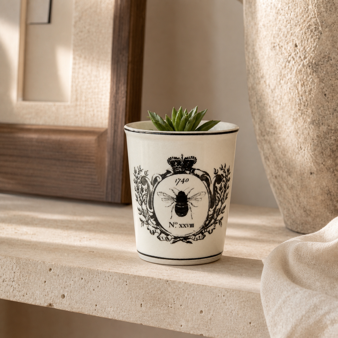 Black and white bee beaker in a luxury interior