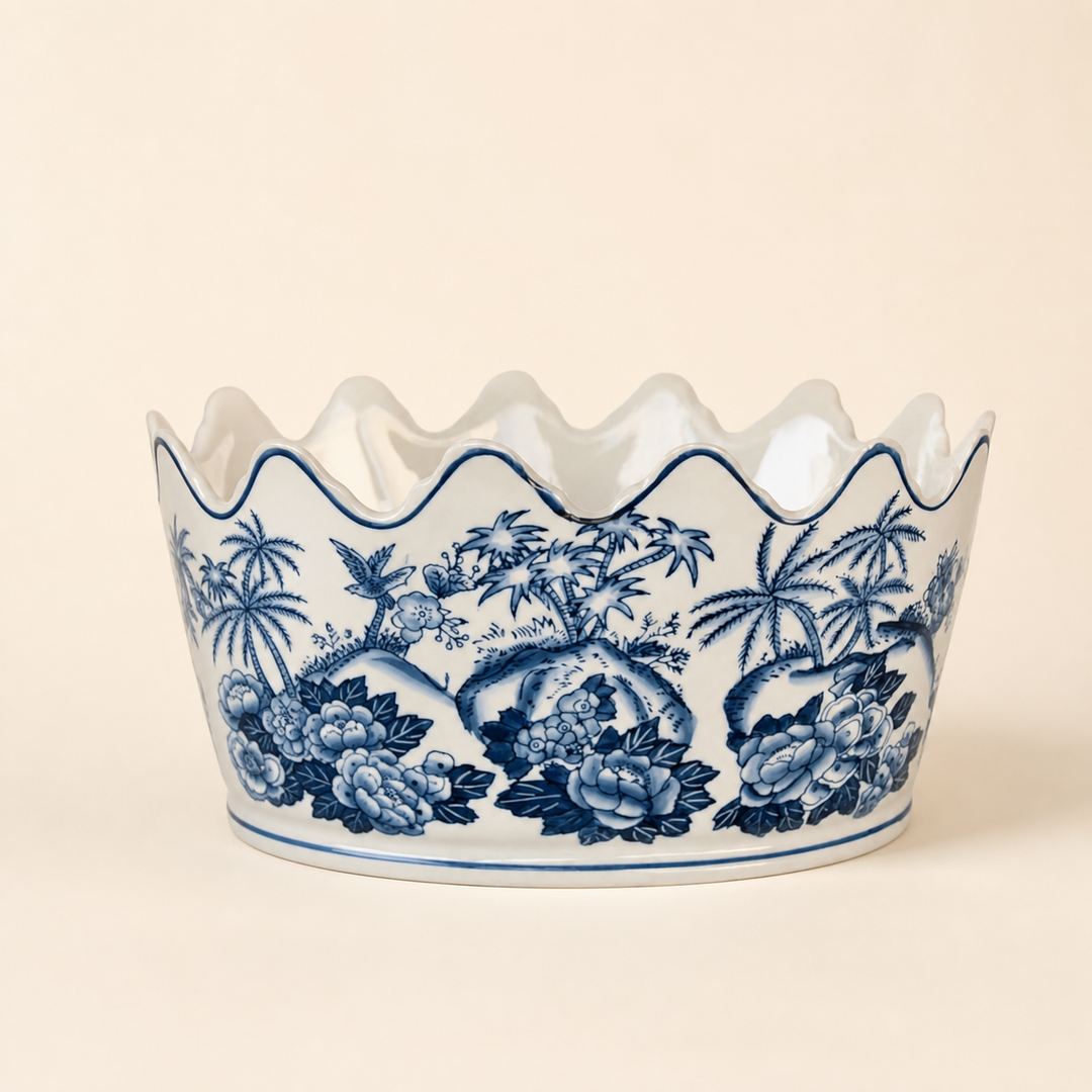 Blue scalloped planter on warm ivory background