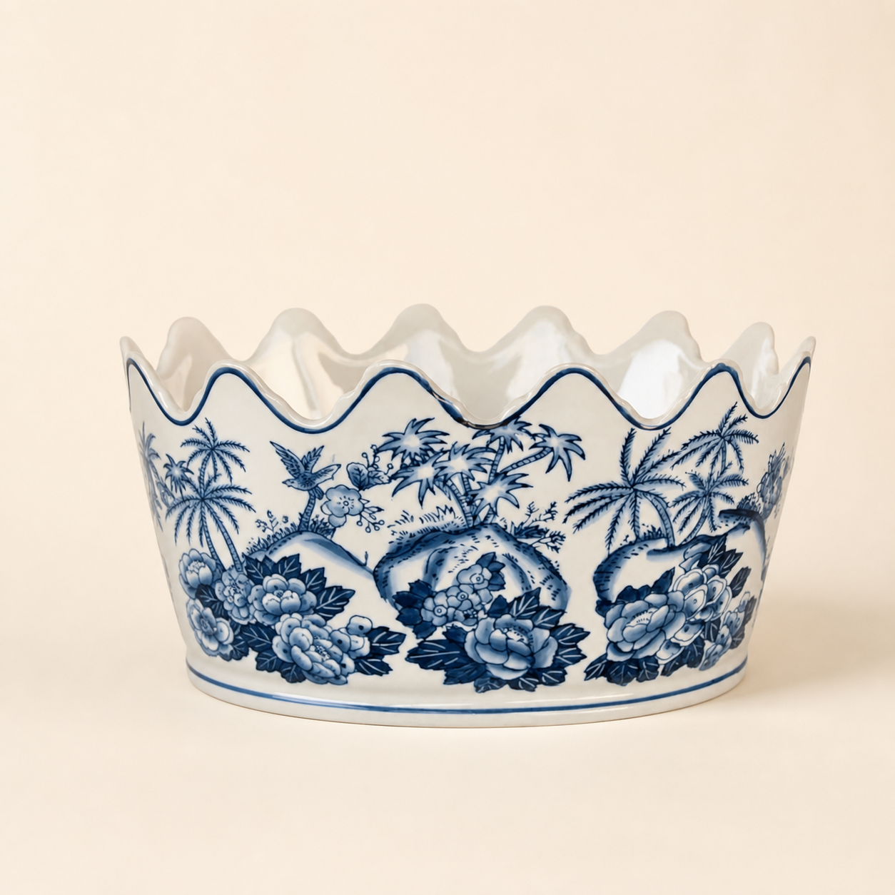 Blue scalloped planter on warm ivory background