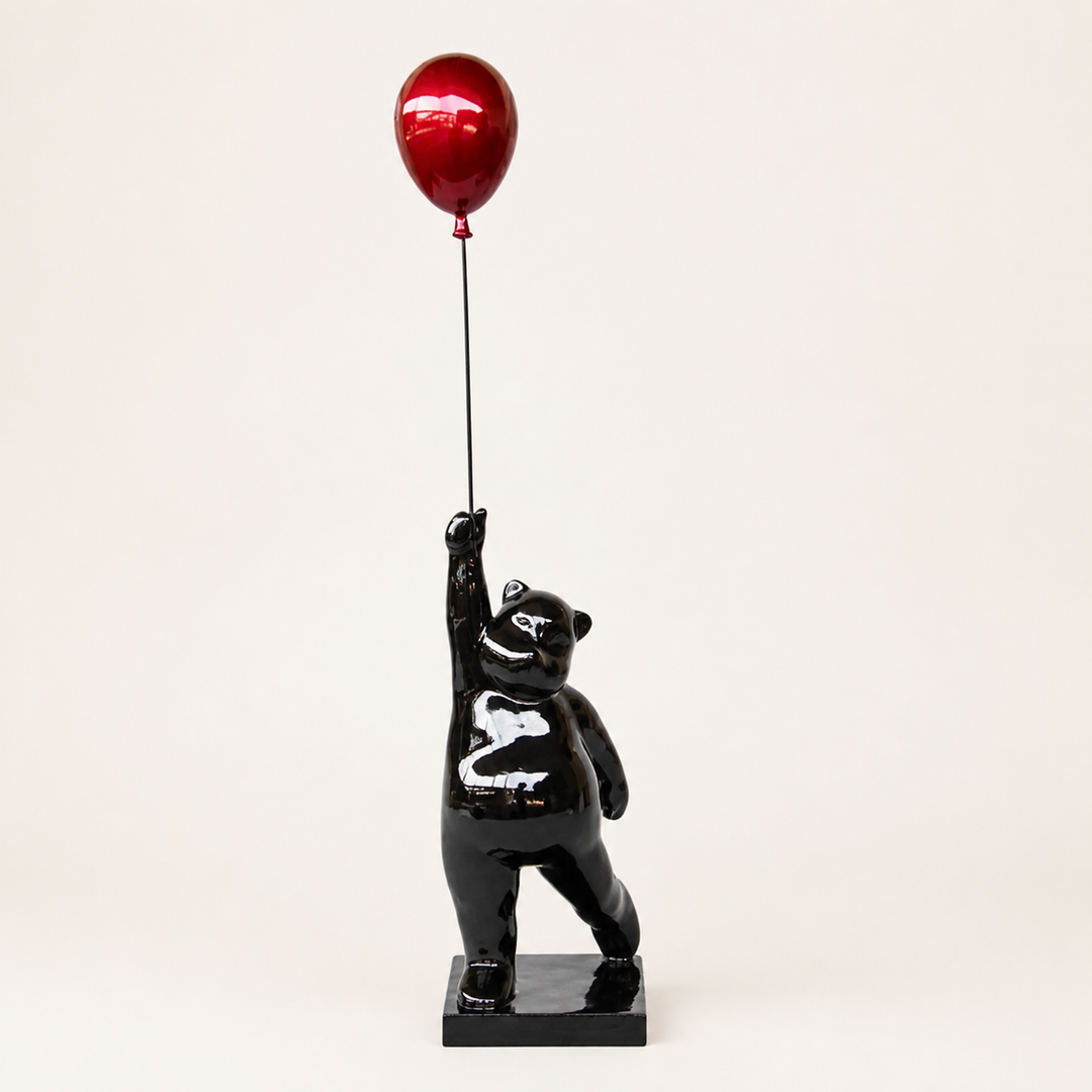Large black bear holding red balloon - catalogue