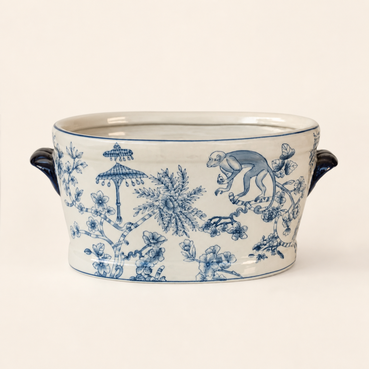 Large blue monkey foot bath on warm ivory catalogue background