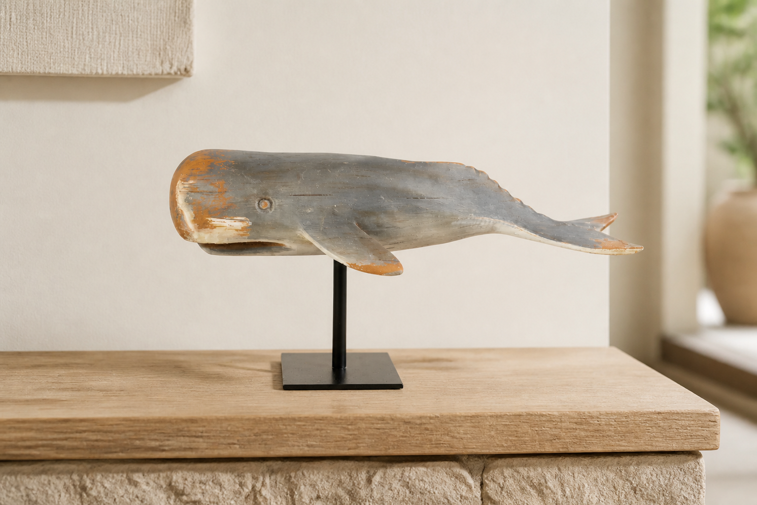 Medium grey whale on stand — luxury lifestyle image
