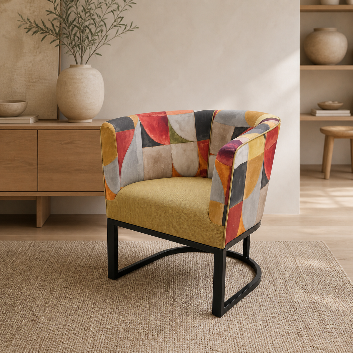 Metal tub chair with Stuart Graham and Home Fabrics in a luxury interior
